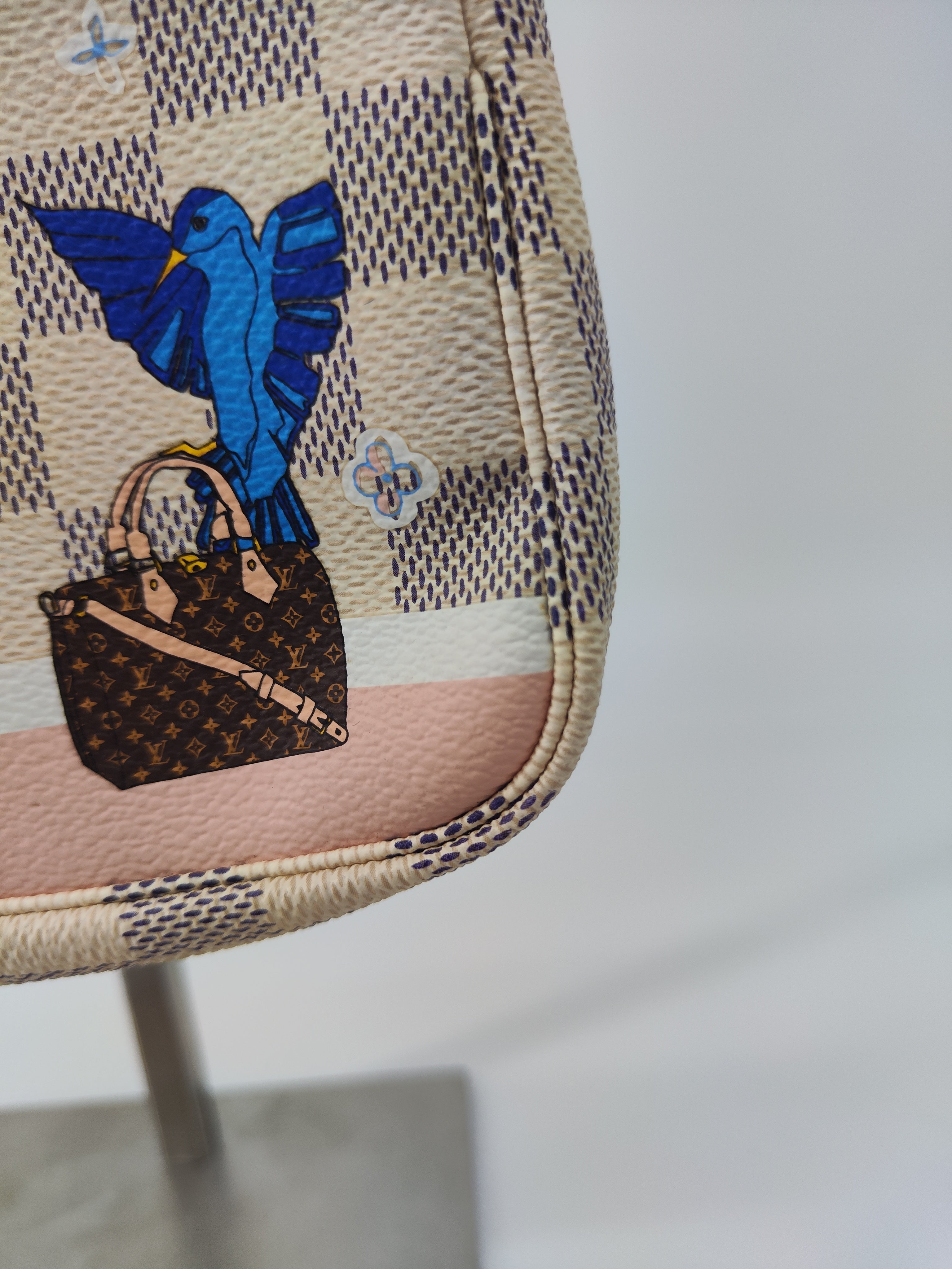 Pochette LV limited edition migrazione