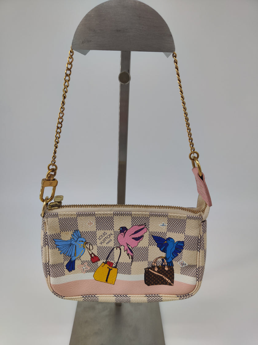 Pochette LV limited edition migrazione