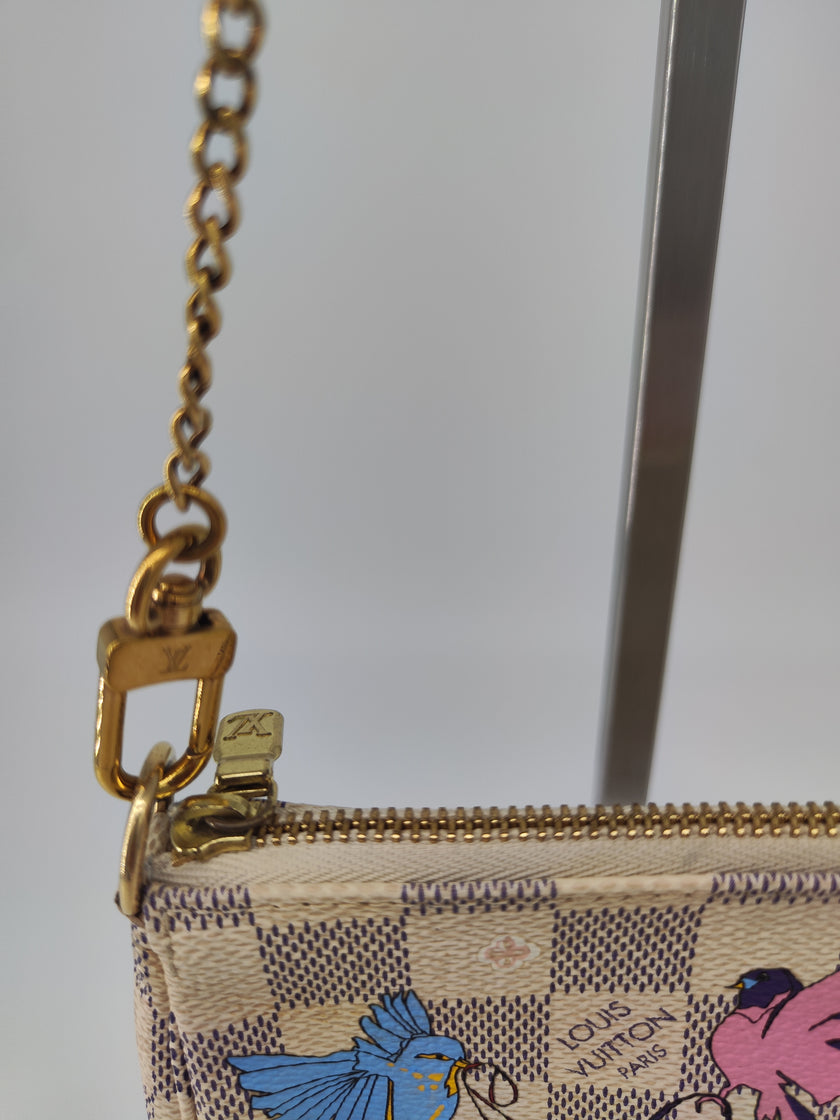 Pochette LV limited edition migrazione